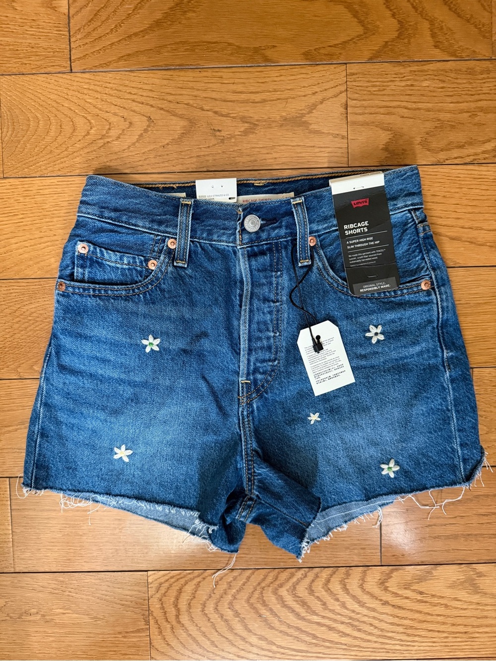 Levi's Blue Denim High-Rise Shorts with White Flower Embroidery